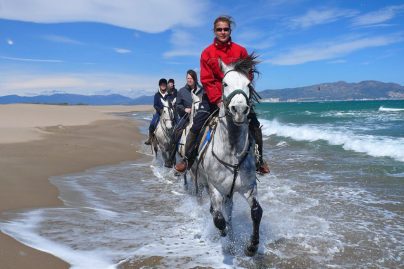 Horseback riding on the beach in Spain