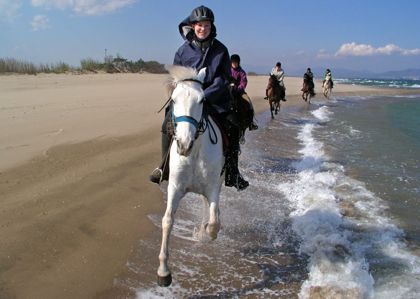 Enjoy horseback riding on the beach in Spain on the Mediterranean Trail